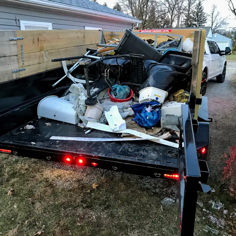 Roll-off dumpster delivered to a residential driveway in Wauchula